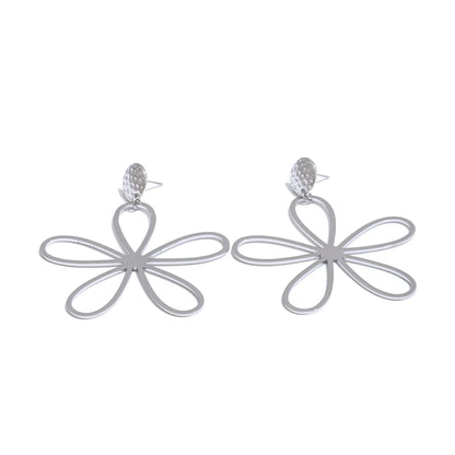 boucles d oreilles fleurs – l’élégance qui fait tourner les têtes à Paris