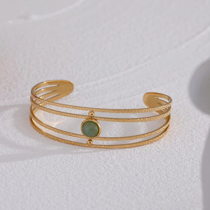 Bracelet tendance du moment - Élégance bohème avec pierre verte et éclat doré