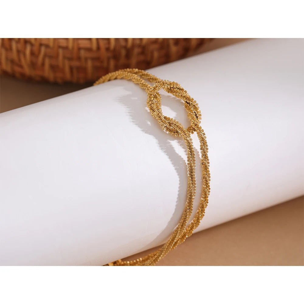 bracelet-doré-noeud-de-gypsophile-élégant