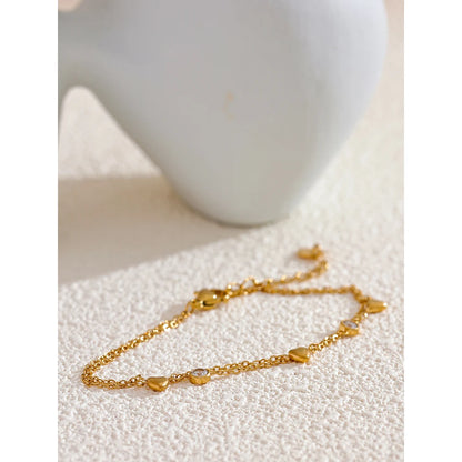 bracelet-femme-plaque-or-double-coeur-etincelant-doré