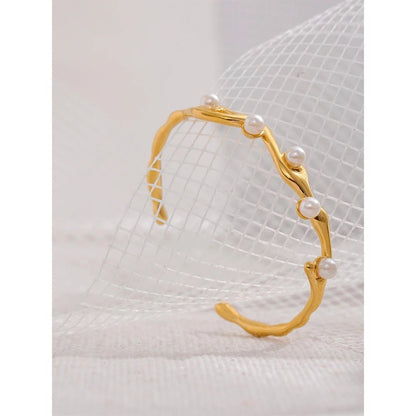 bracelet-jonc-charme-torsad-et-perles-elegantes