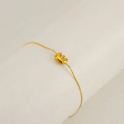 bracelet-lettre-acier-e