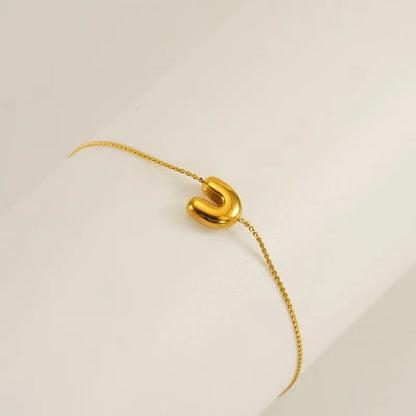 bracelet-lettre-acier-u