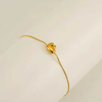 bracelet-lettre-acier-f