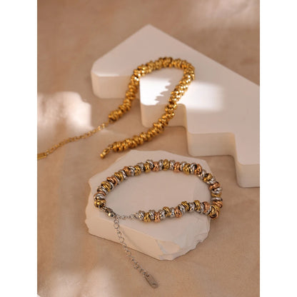bracelet-plaqué-or-audace-et-éclat-en-trois-nuances